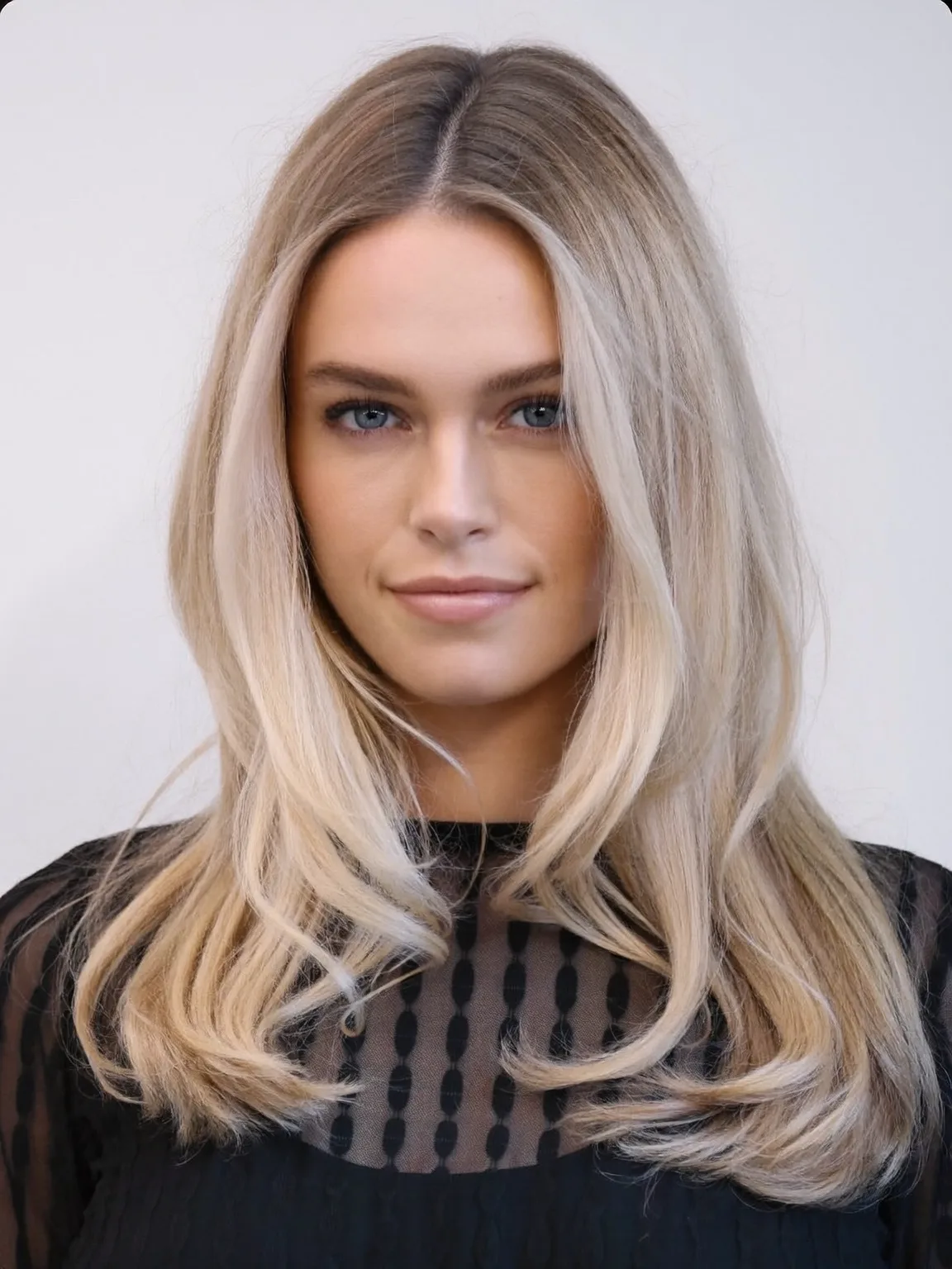 Soft Sandy Blonde Medium Volume Layers with Natural Texture