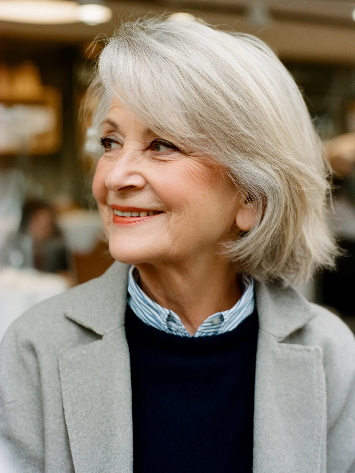 Blow-Dried Straight Silver Frost Bob with Side-Swept Bangs