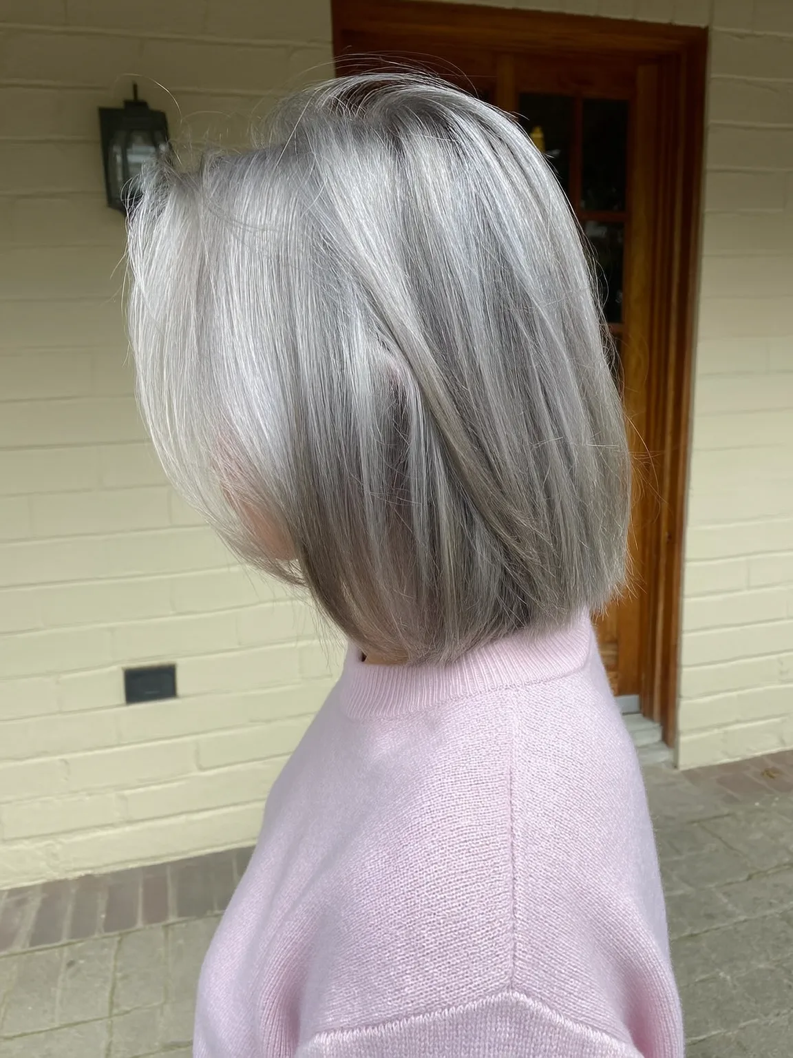 Silver Frost Bob with Side-Swept Bangs and Medium Volume