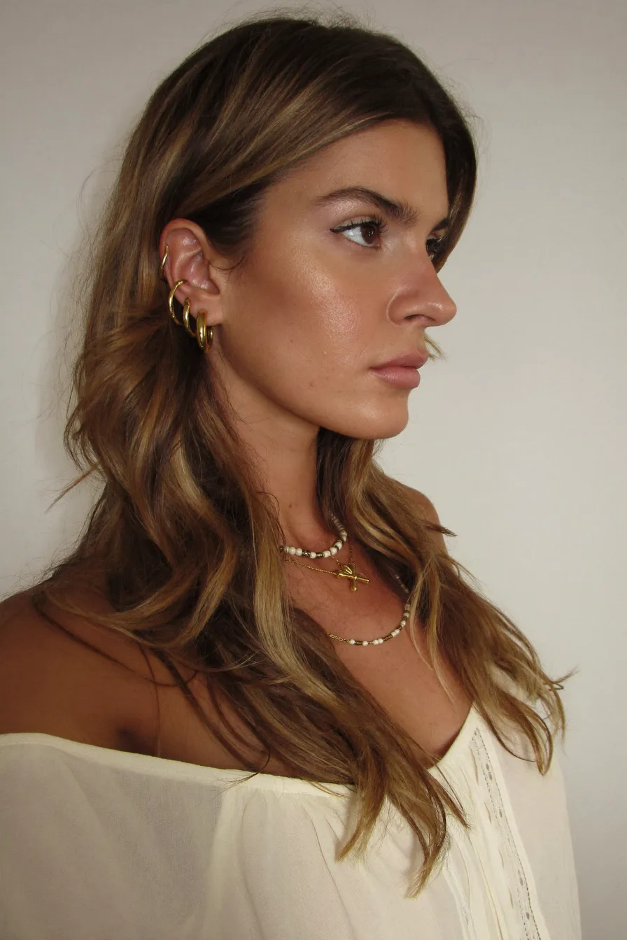 Sun-Kissed Caramel Brown Long Layered Hair With Natural Waves