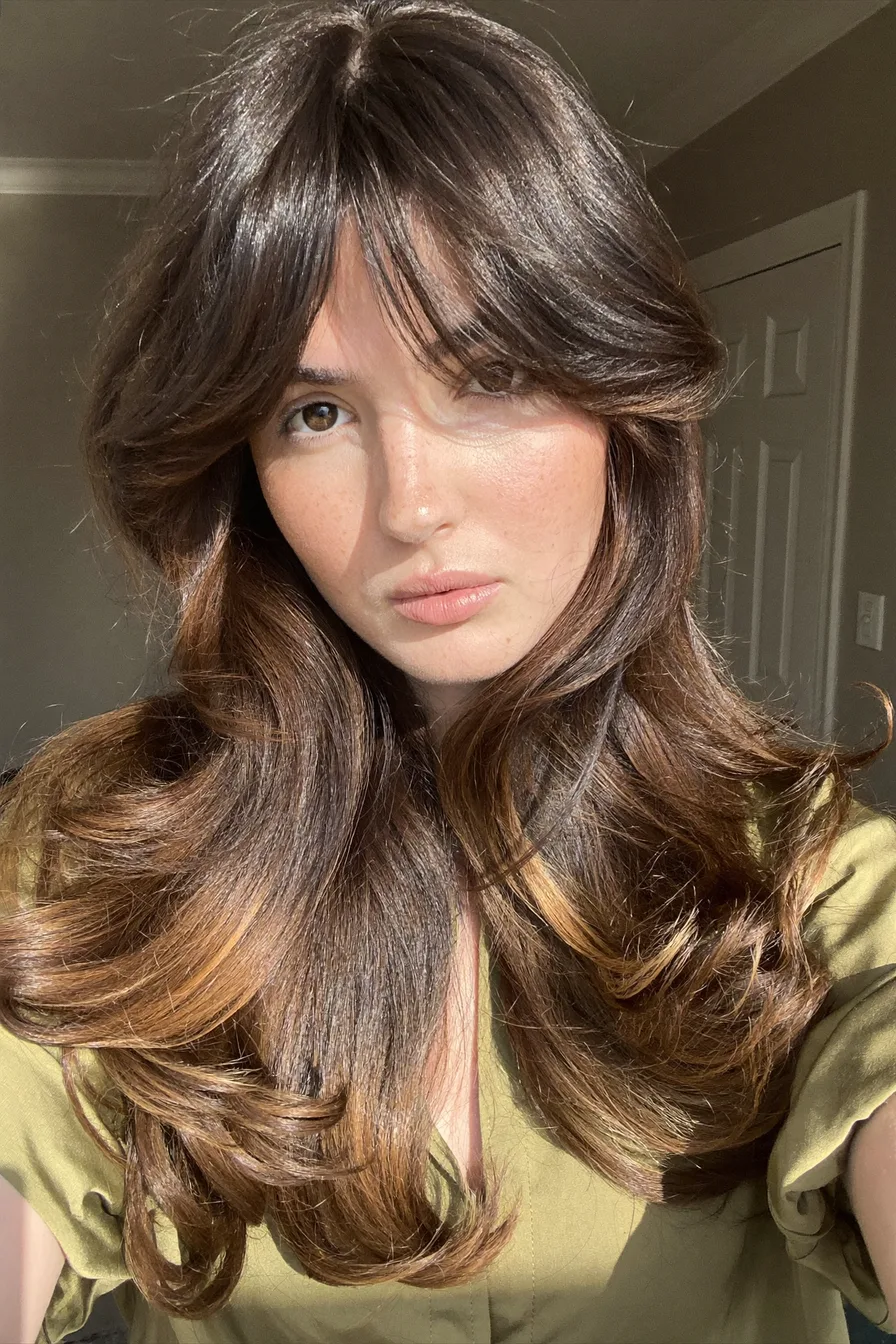 Face-Framing Caramel Brown Long Layered Hair with Full Fringe