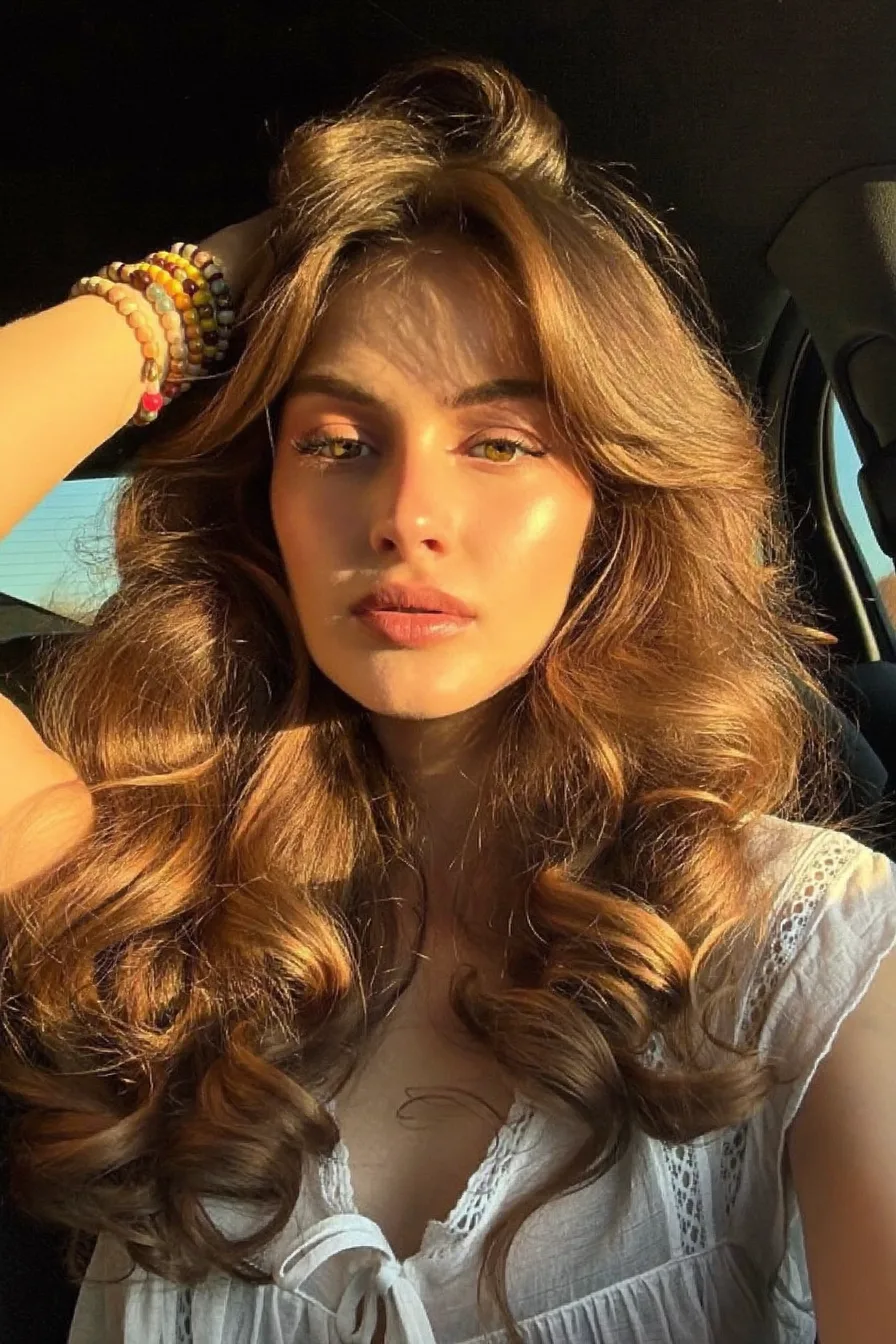 Voluminous Caramel Brown Long Layered Waves with Shine