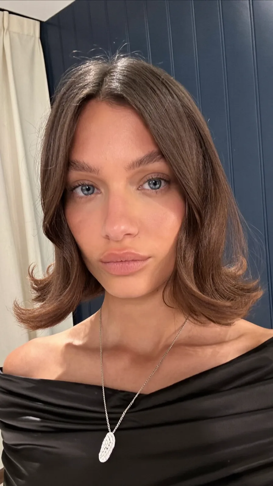 Chic Center-Parted Chin-Length Blunt Bob with Flicked Ends