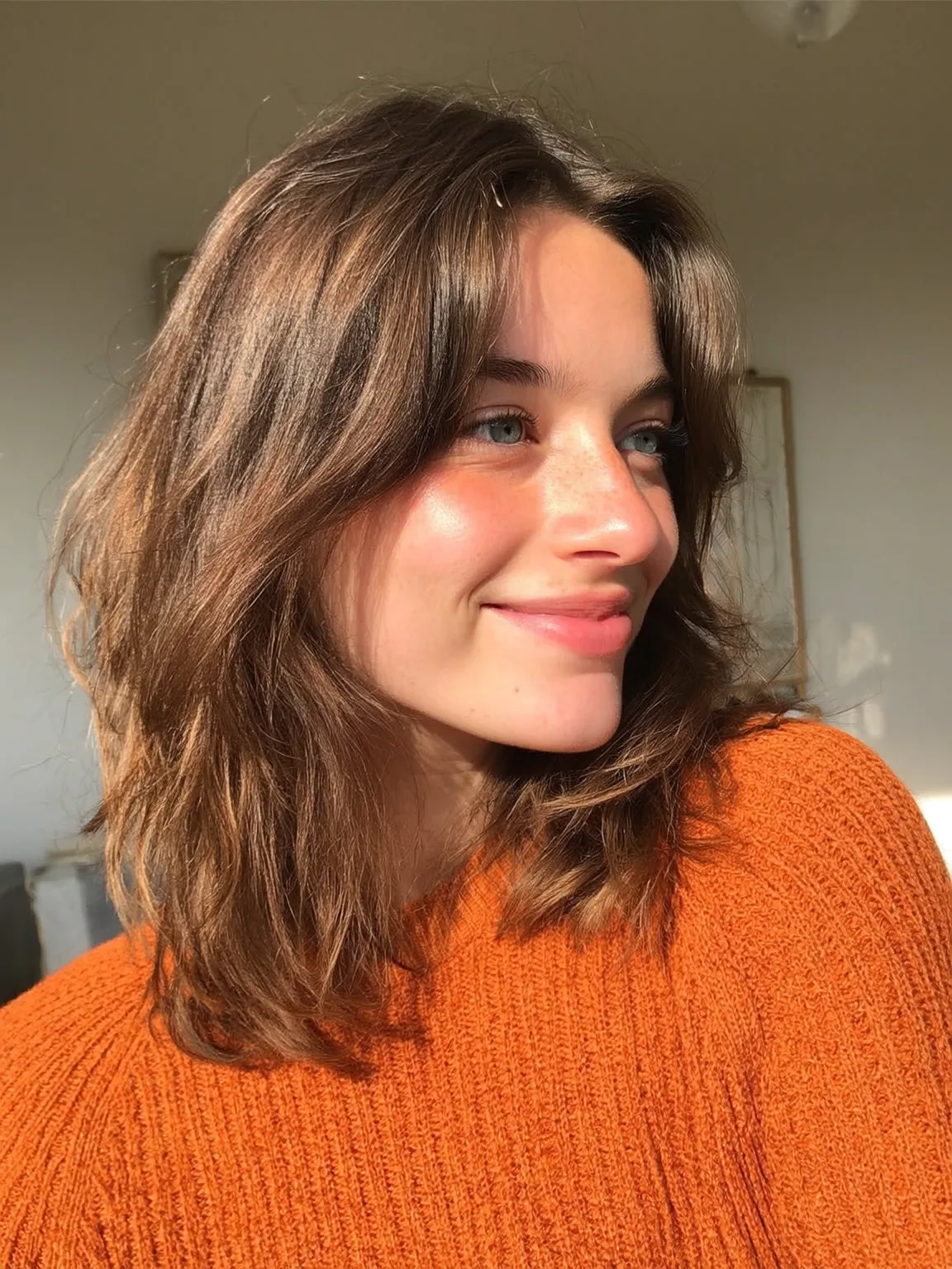 Soft Chestnut Brown Wavy Lob with Curtain Bangs