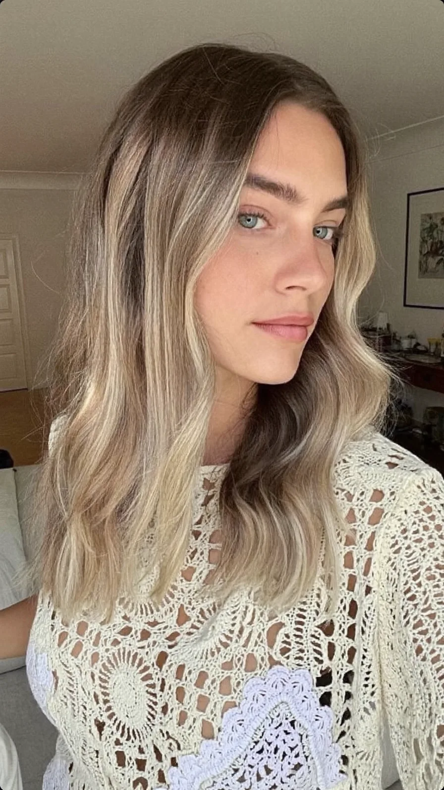 Medium Length Wavy Hair with Cool Blonde Balayage Highlights