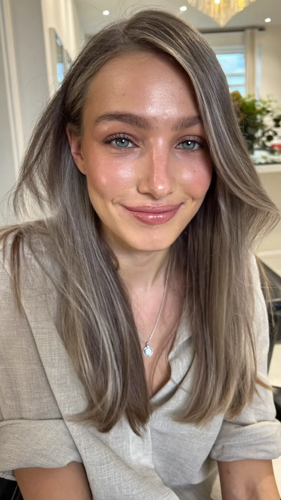 Modern Ash Brown Long Layered Hairstyle with Subtle Highlights