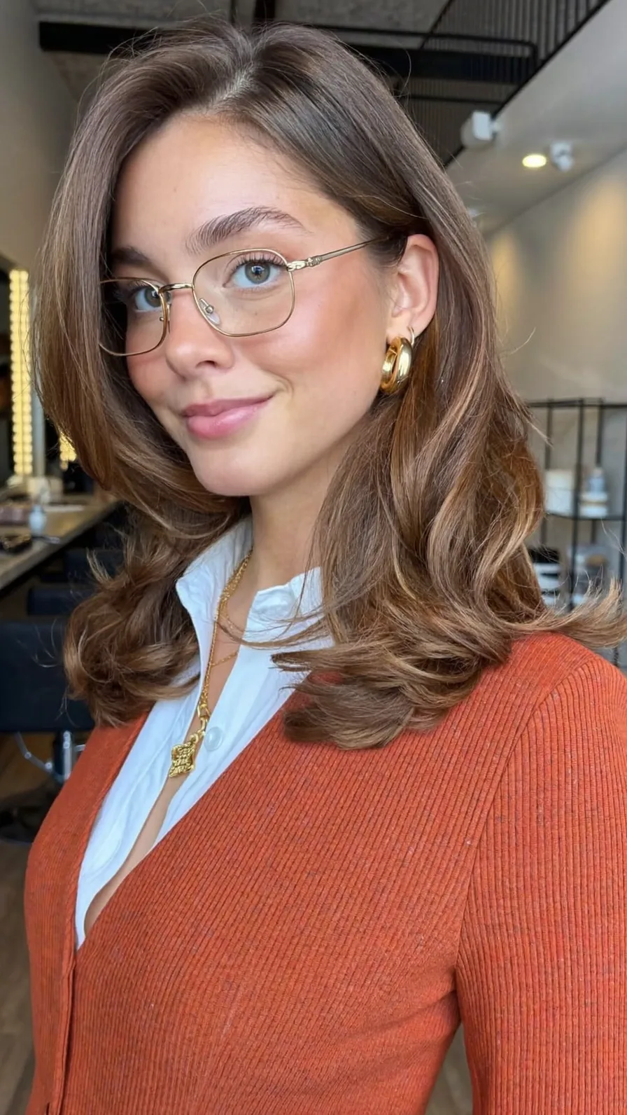 Medium Layered Hair with Flicked Ends and Side-Swept Bangs