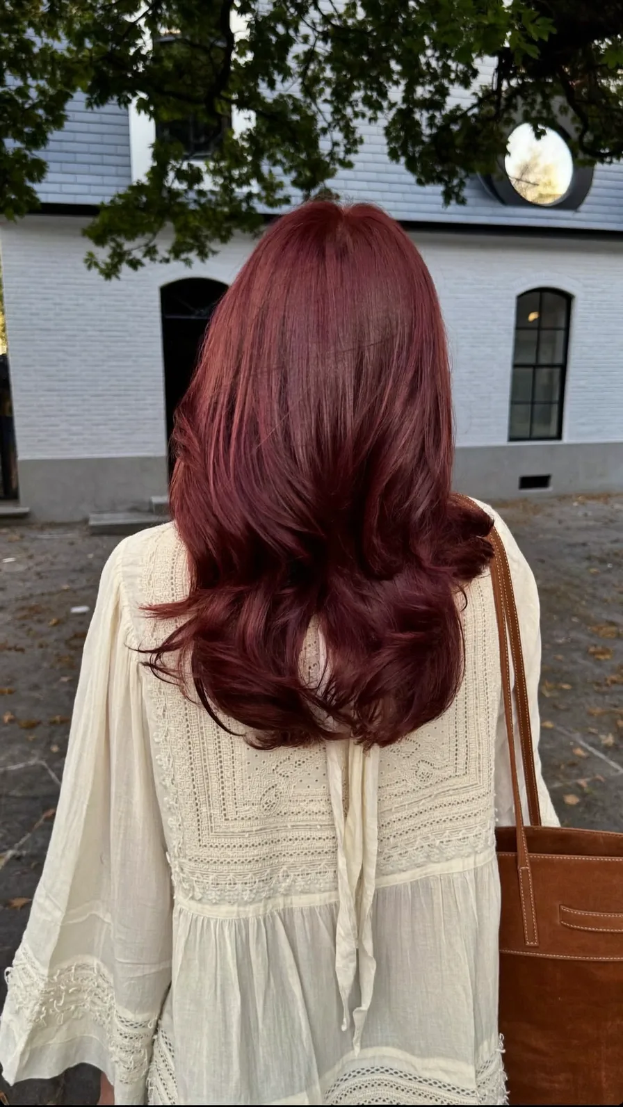Elegant Medium-Length Burgundy Hair With Flowing Long Layers