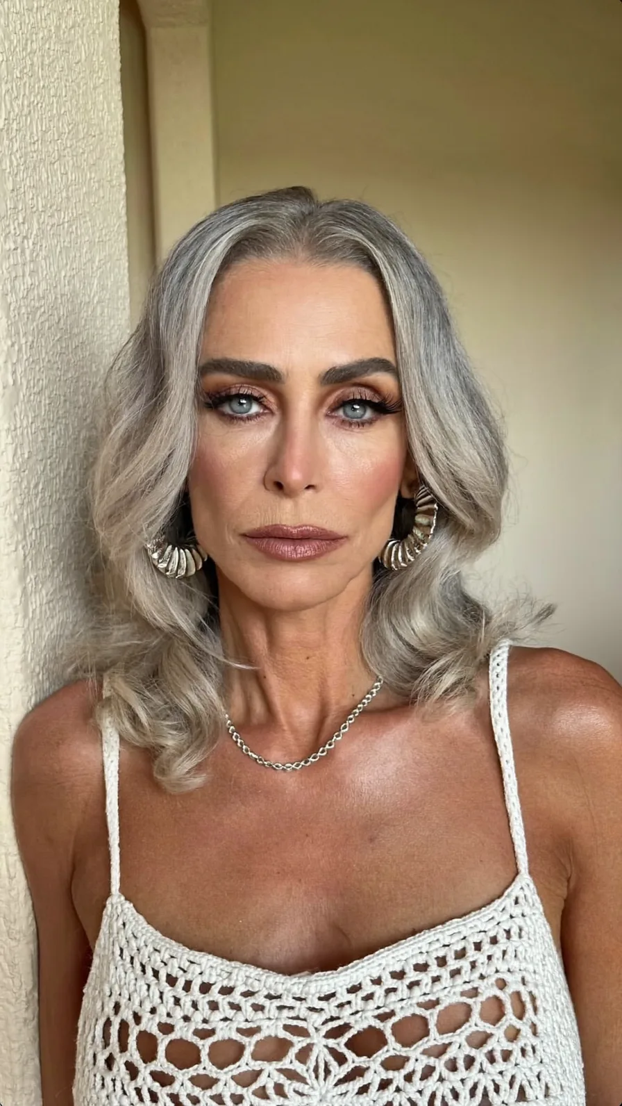 Elegant Silver Gray Medium Layered Wavy Hairstyle