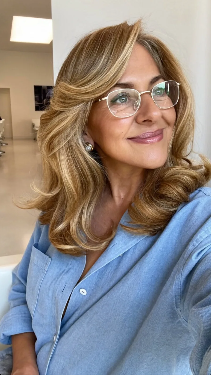Voluminous Honey Blonde Medium-Length Long Layered Hairstyle