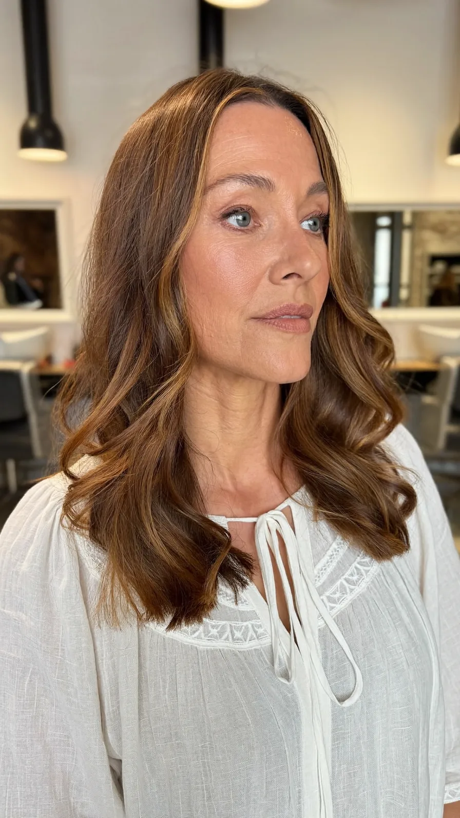 Elegant Medium Length Wavy Layers with Caramel Balayage Highlights