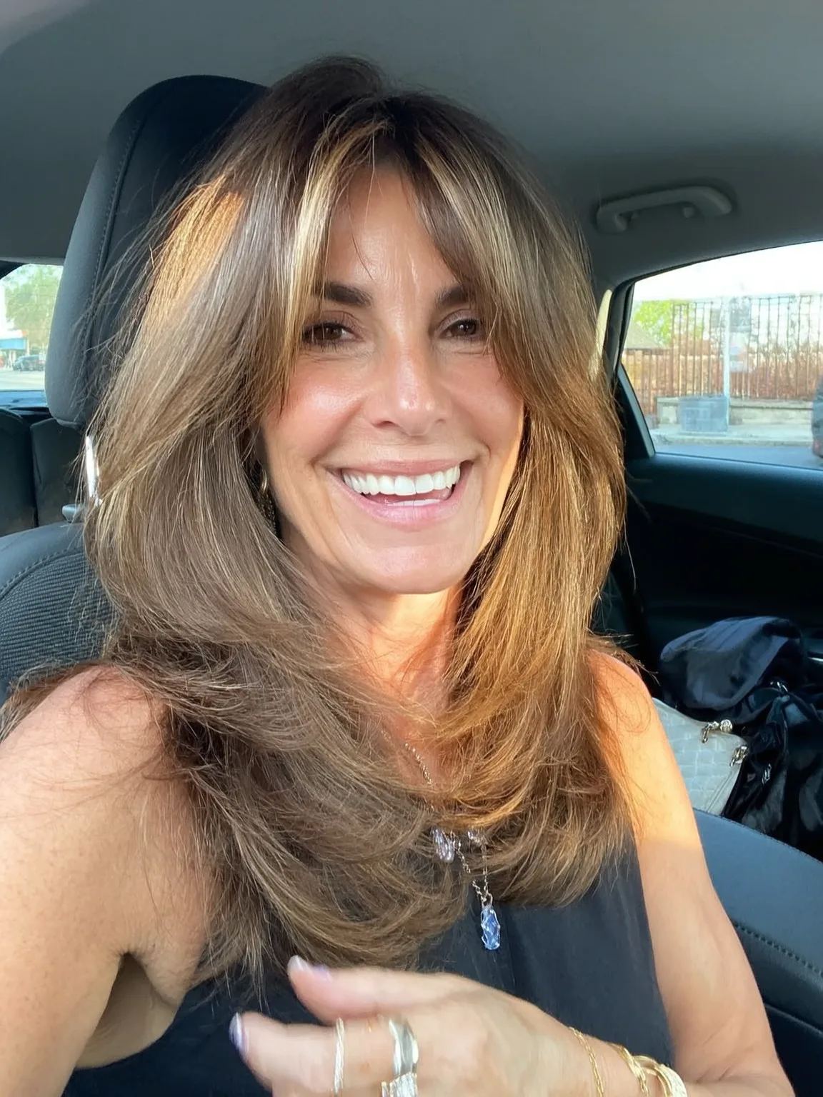 Straight Warm Caramel Voluminous Layers with Curtain Bangs