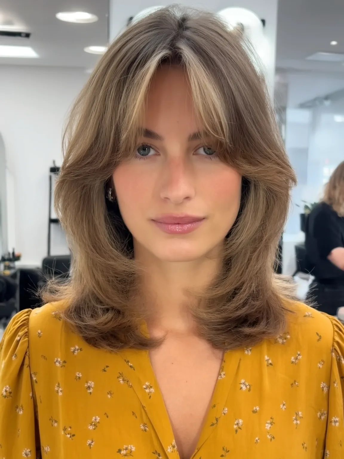 Straight Feathered Light Ash Brown Layers with Curtain Bangs