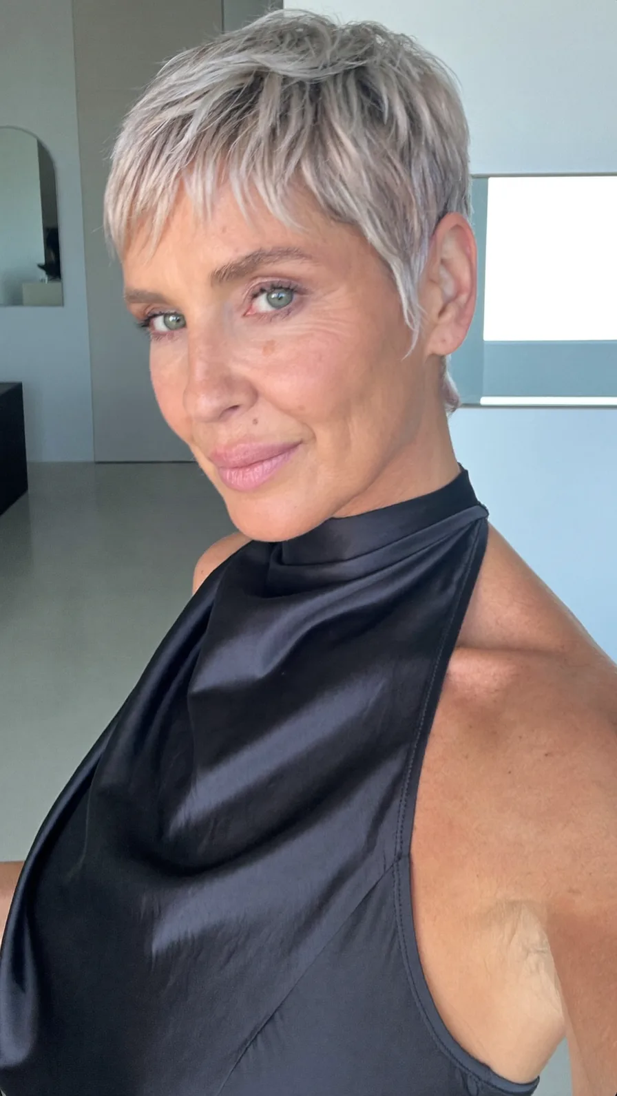 Textured Platinum Pixie Cut with Chic Micro Bangs