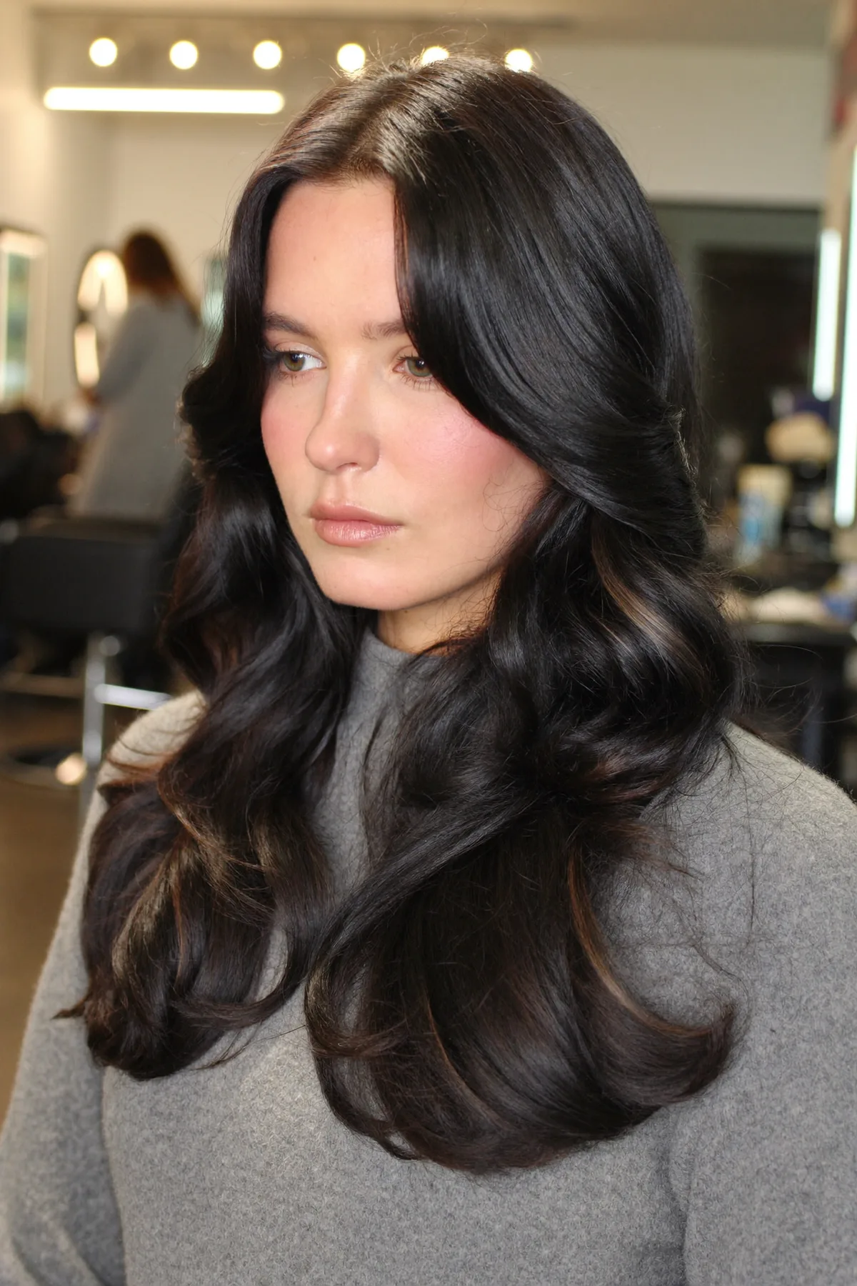 Jet Black Long Layered Waves with Curtain Bangs