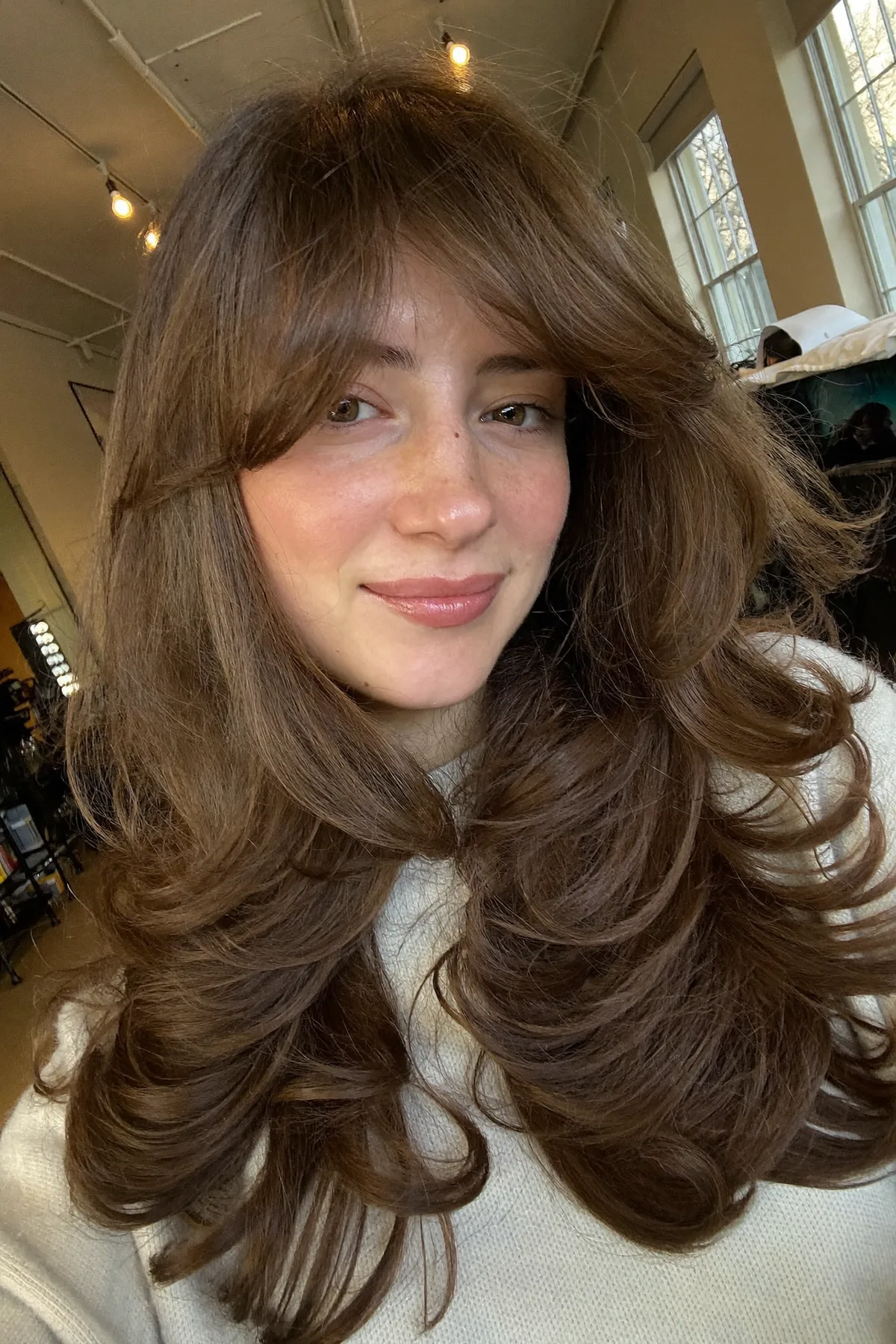 Natural Brunette Mid-Back Long Layered Cut with Curtain Bangs