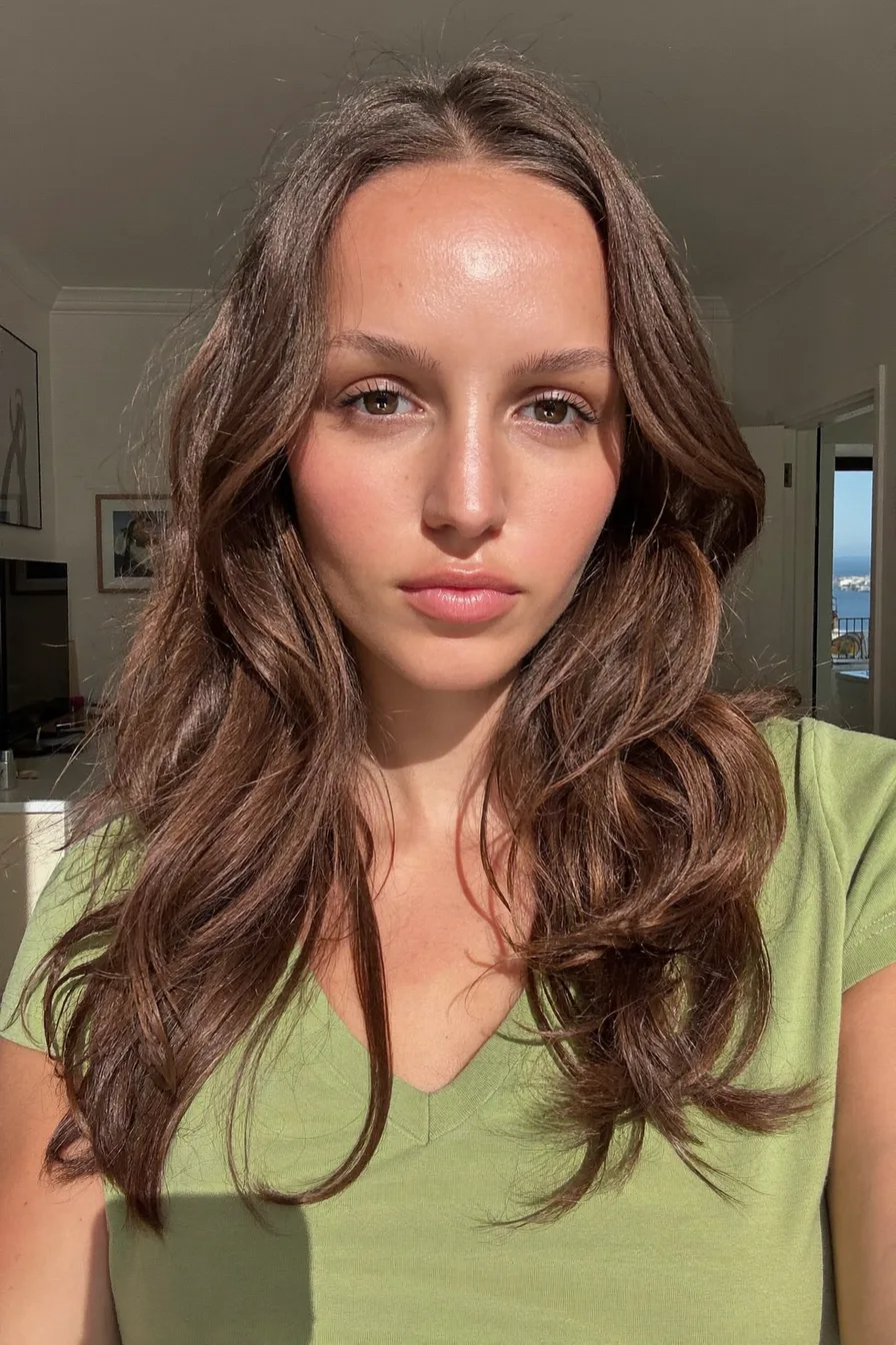 Softly Textured Shoulder-Length Layered Haircut with Natural Waves
