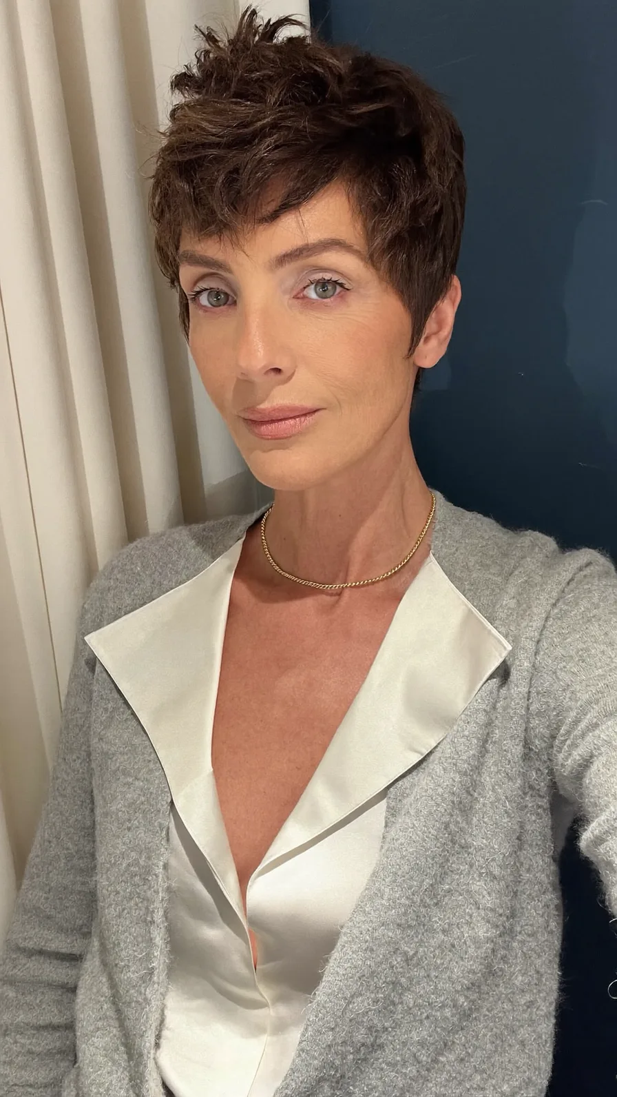 Textured Dark Brown Pixie Cut with Choppy Layers