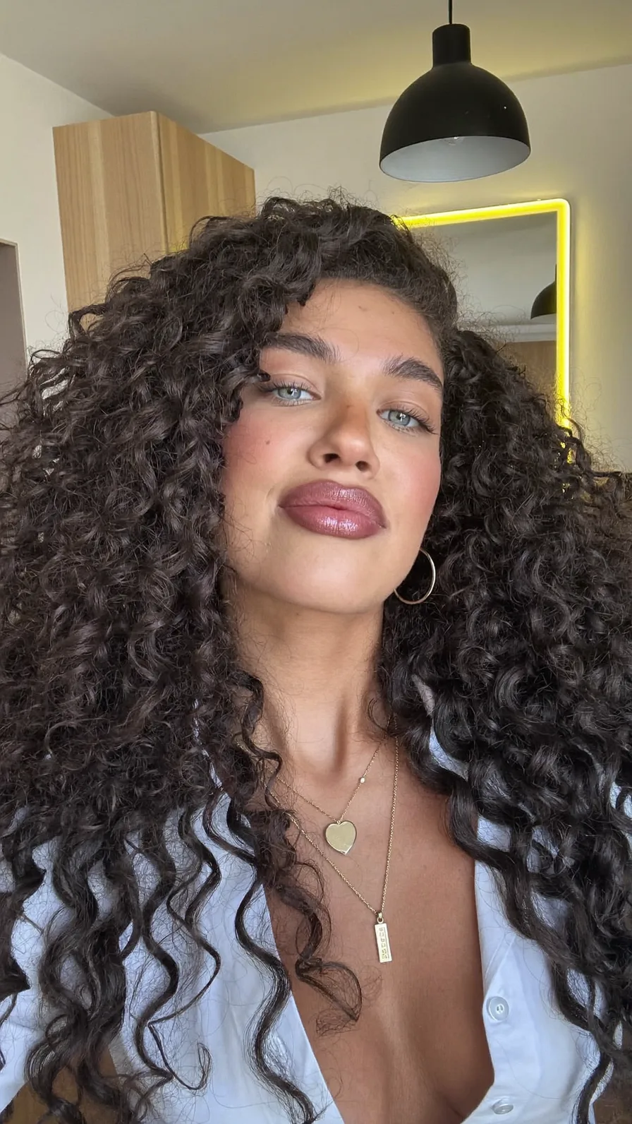 Voluminous Long Layered Curly Hair with Natural Depth