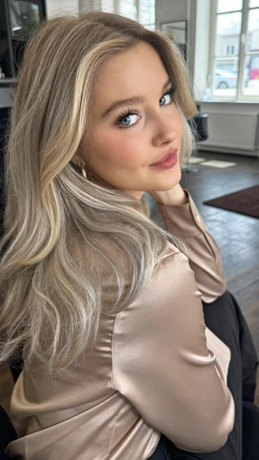 Flowing Long Layered Waves with Ash Blonde Highlights