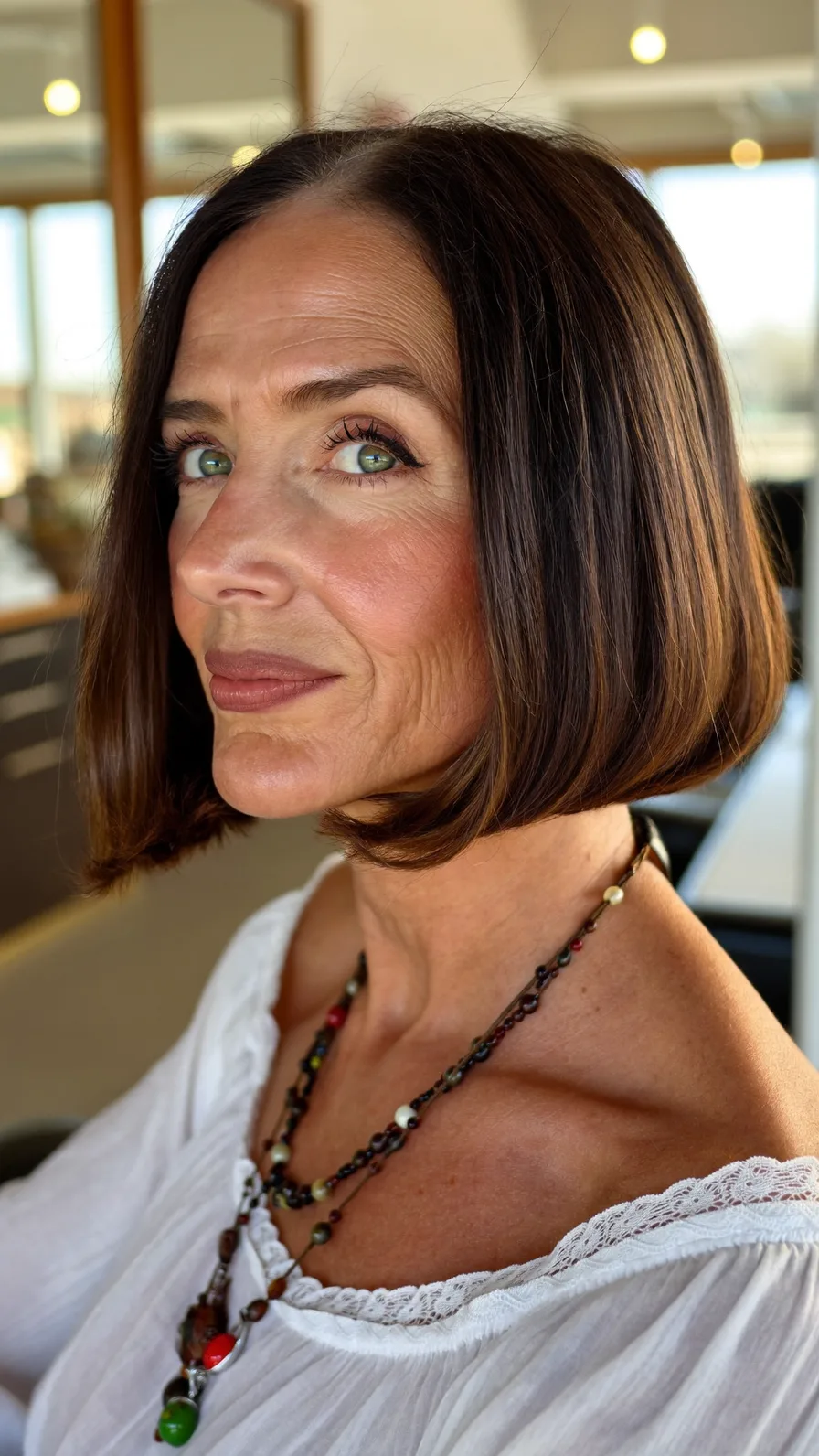 Chic Chin-Length Blunt Bob with Subtle Chestnut Highlights