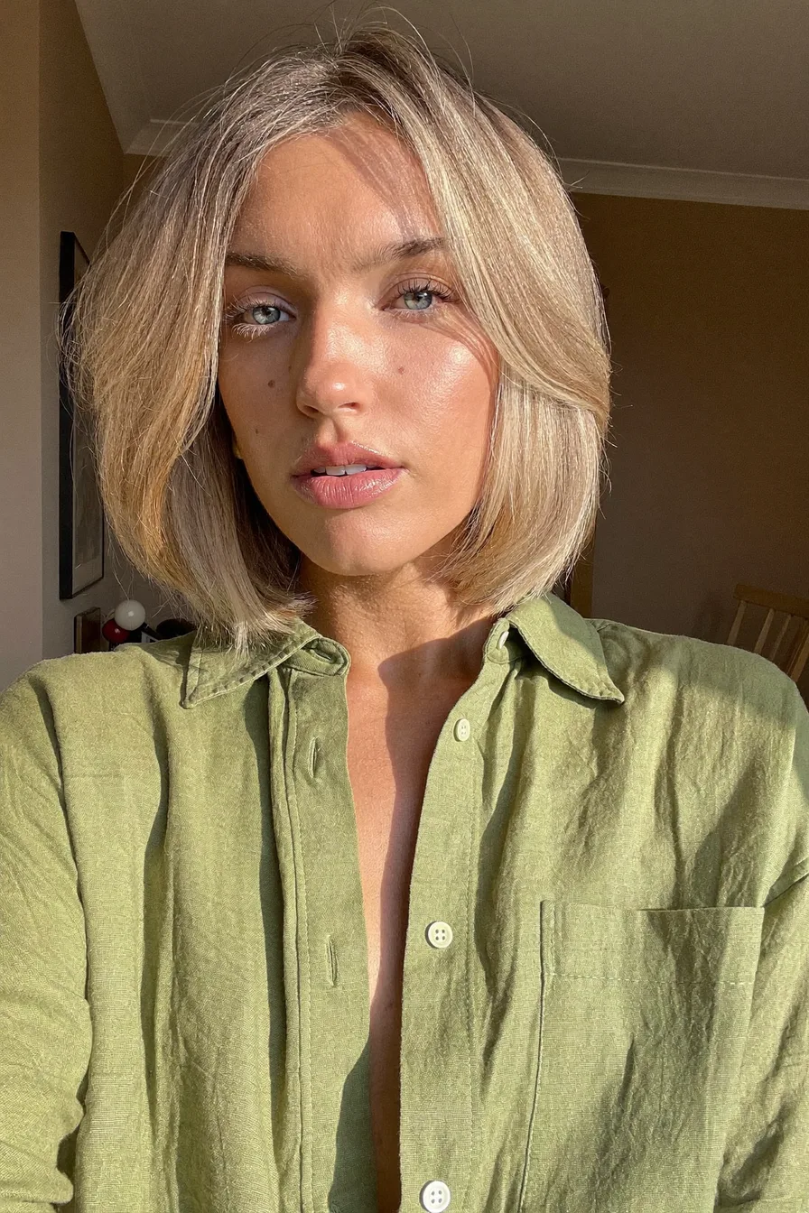 Chic Rounded Chin-Length Bob with Soft Side-Swept Bangs