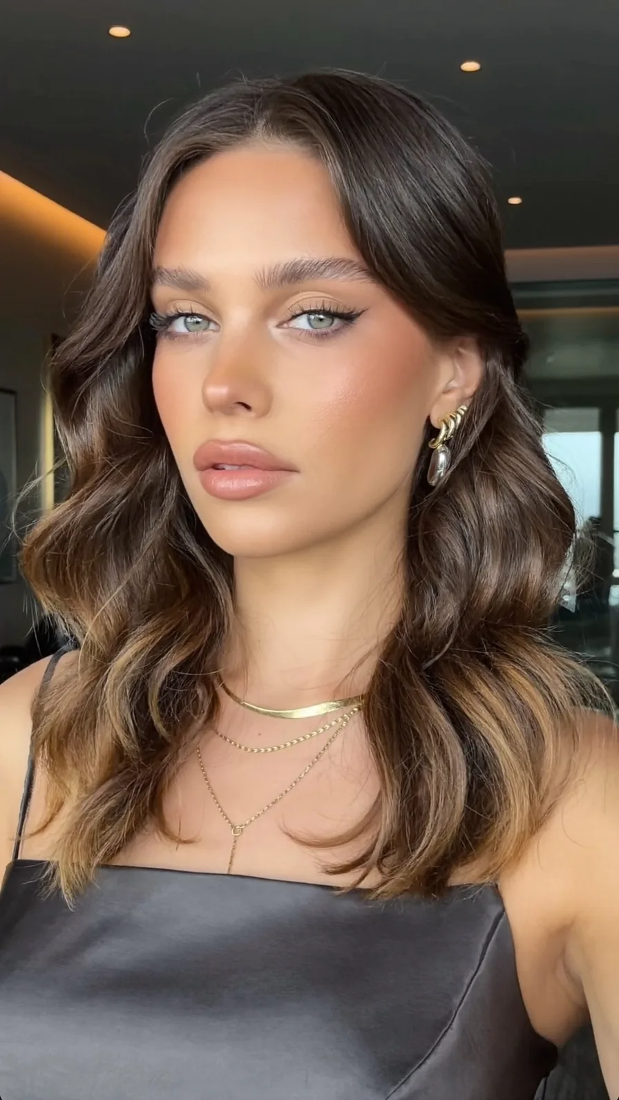 Soft Layered Lob with Subtle Caramel Balayage Highlights
