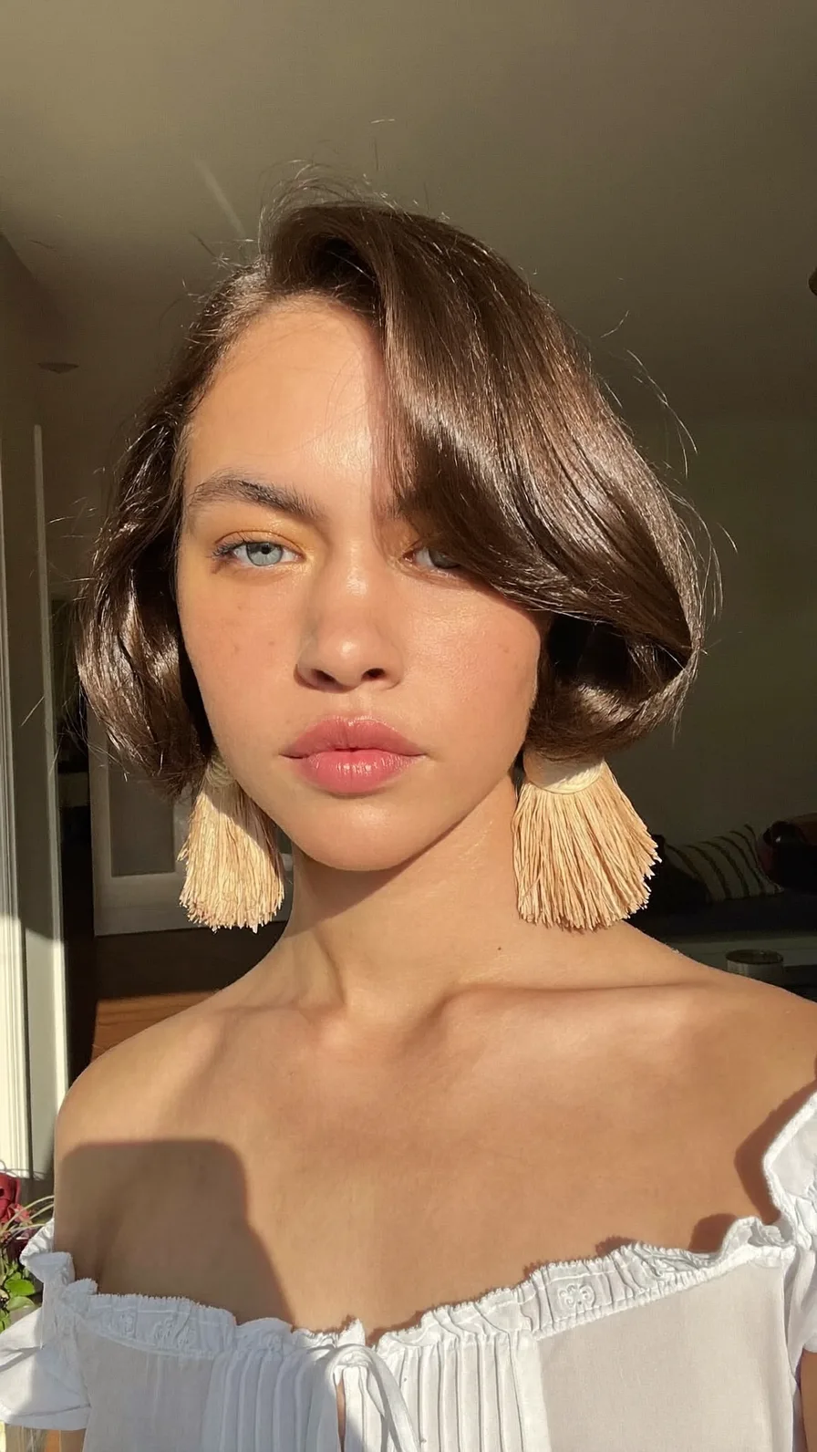 Elegant chin-length classic bob with side-swept volume