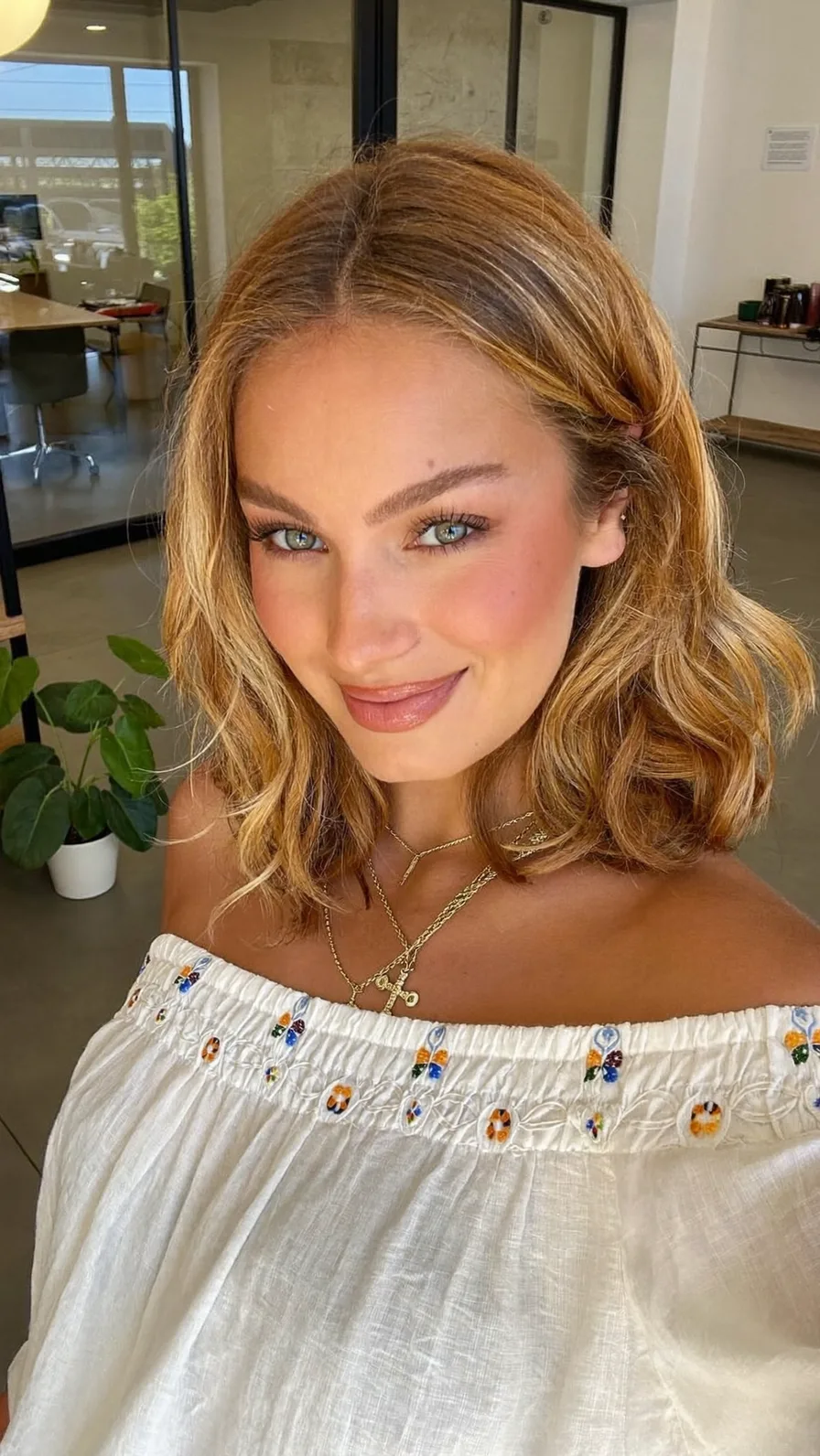 Soft Wavy Honey Blonde Shoulder-Length Lob Hairstyle