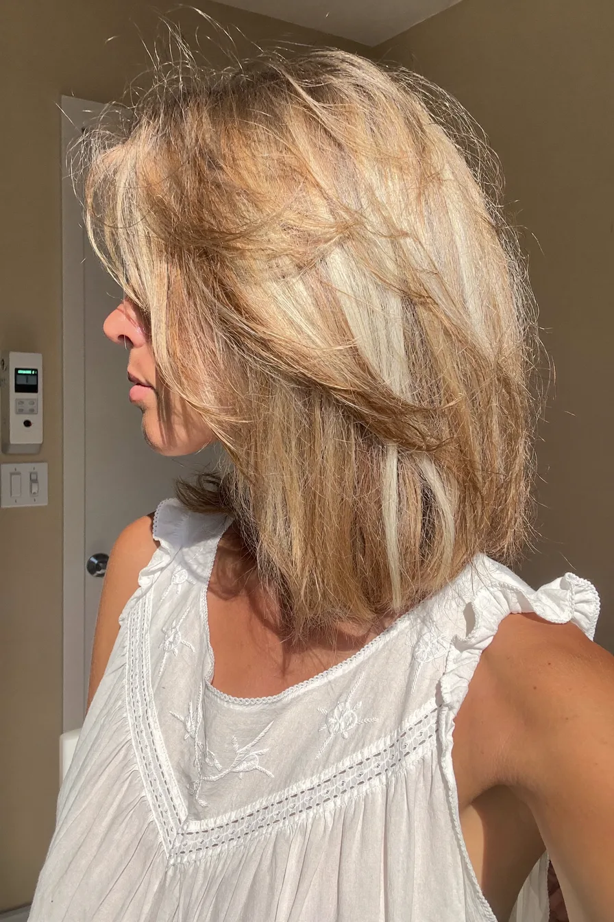 Modern Textured Shoulder-Length Honey Blonde Long Bob