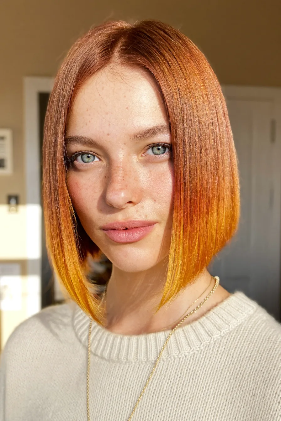 Sleek Chin-Length Bob with Fiery Ombre Copper Color