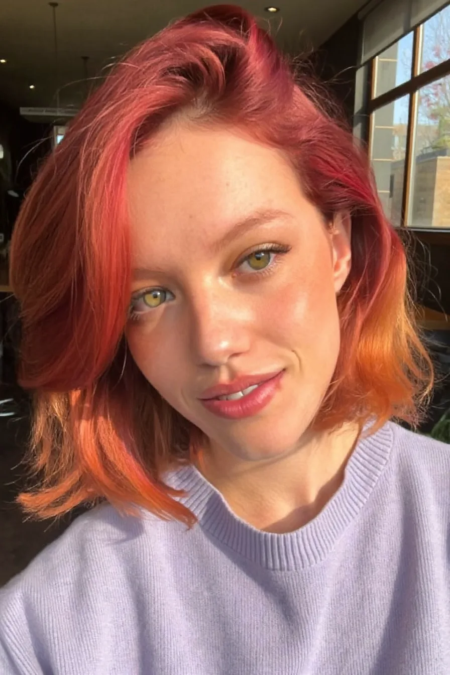 Vibrant Coral Ombre Lob with Flicked Ends and Side Part