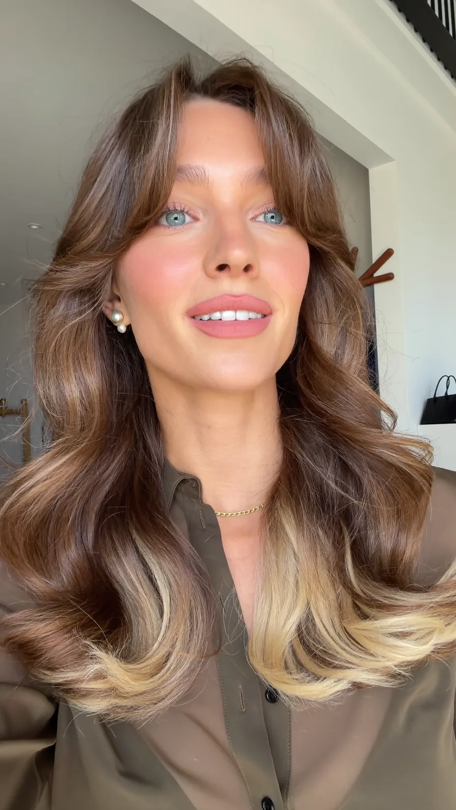 Voluminous Long Layers with Soft Curtain Bangs and Ombre Ends