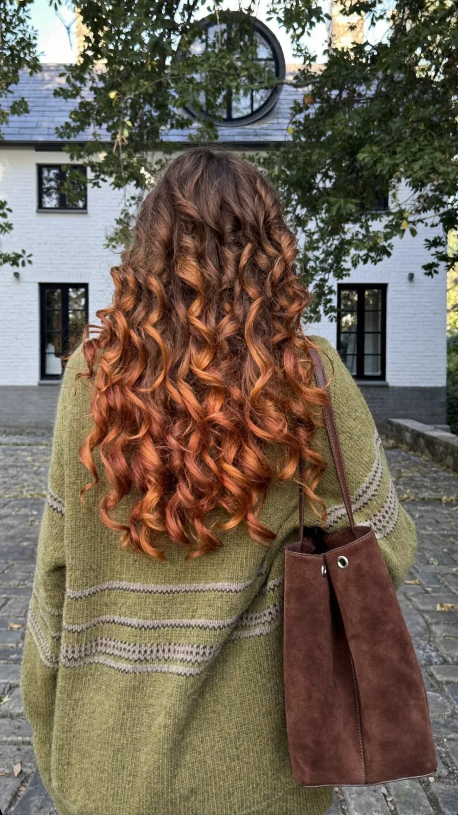 Voluminous Long Curly Layers with Copper Ombre Finish