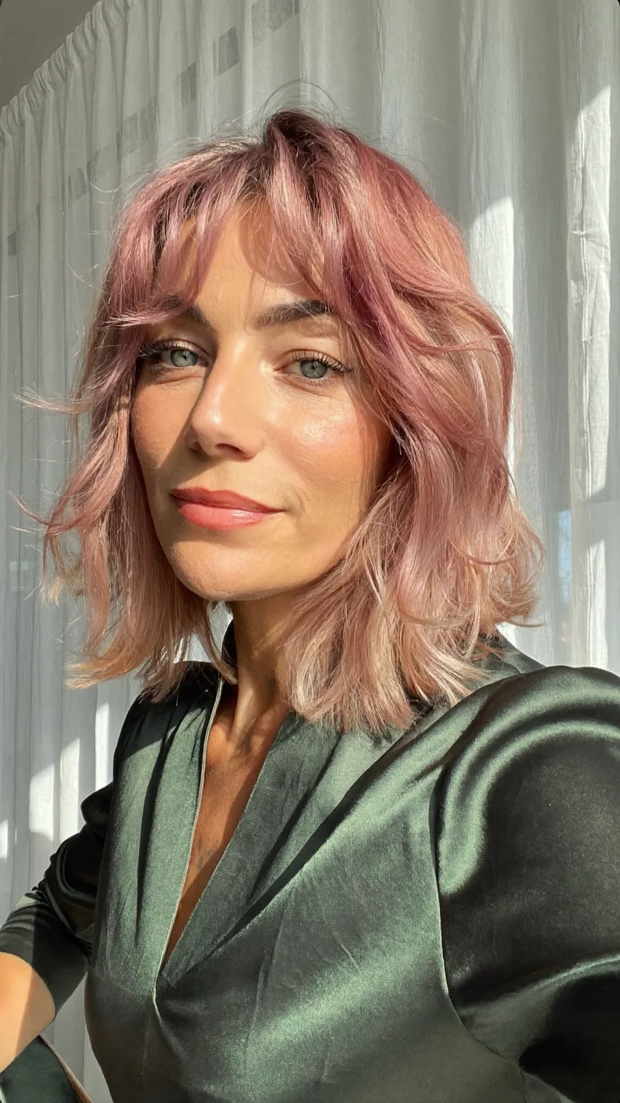 Soft Dusty Rose Layered Hair with Curtain Bangs Styling
