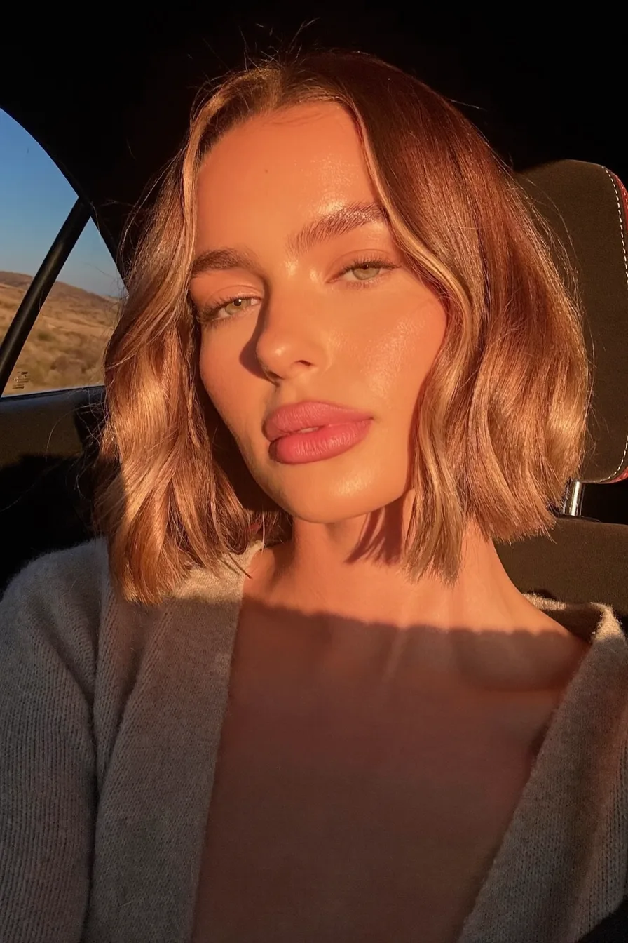 Warm Honey Blonde Blunt Bob with Soft Curtain Bangs
