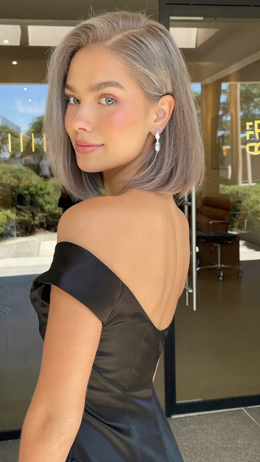 Sleek Side-Parted Ash Gray Blunt Bob Hairstyle