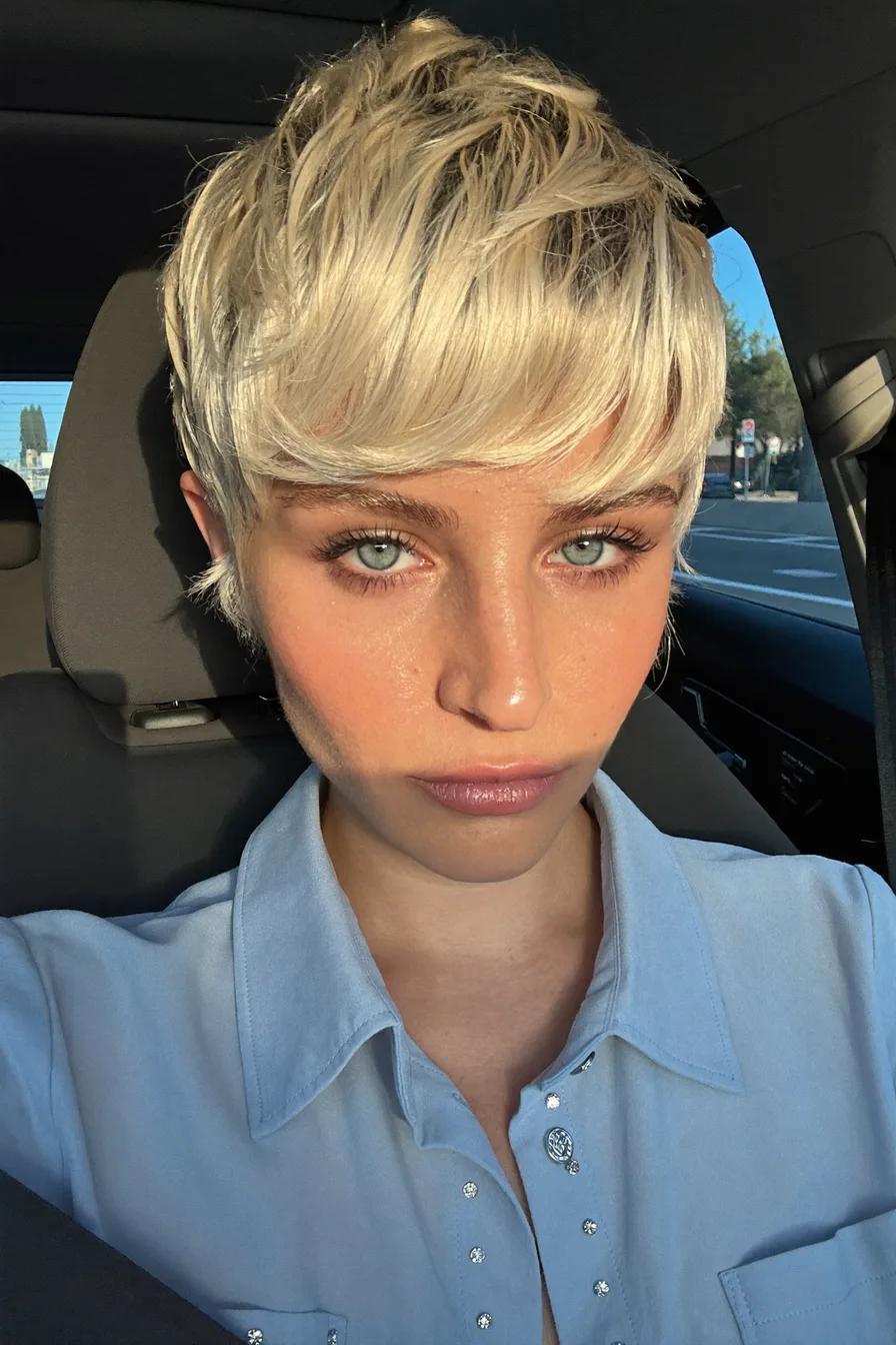 Textured Platinum Pixie-Bob with Side-Swept Bangs for Modern Edge