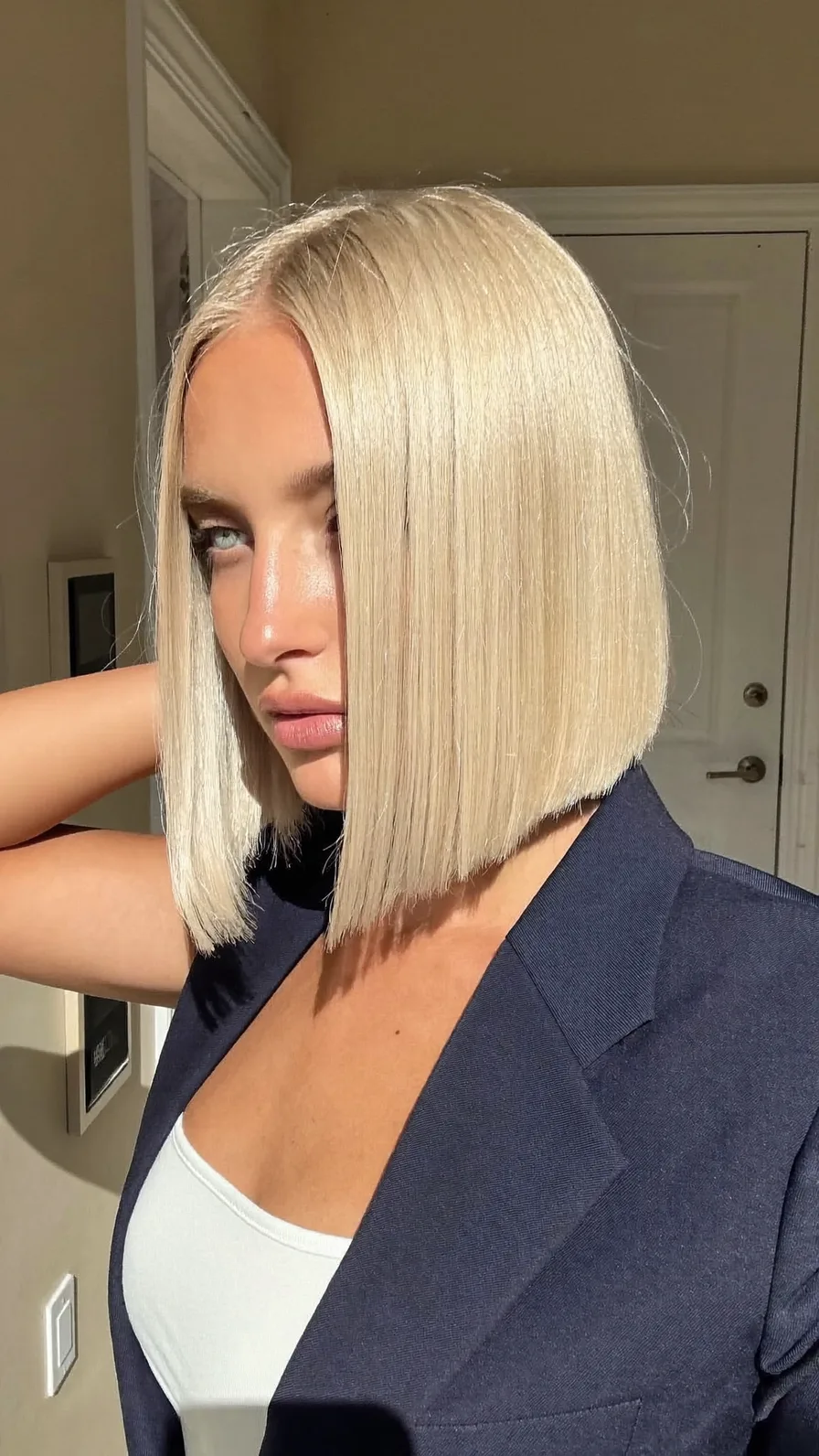 Sleek Platinum Blonde Chin-Length Blunt Bob Hairstyle