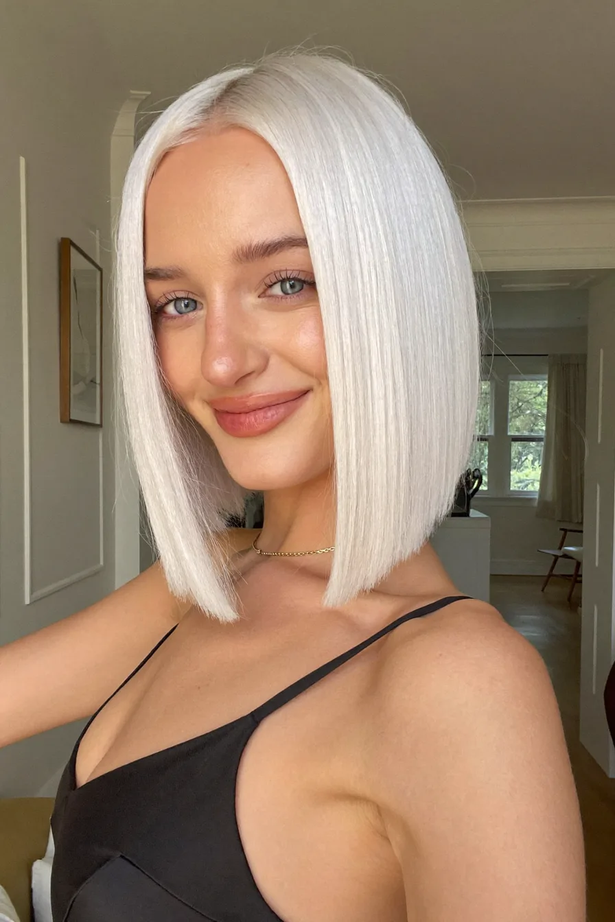 Sleek Platinum Blonde Blunt Bob with Center Parting