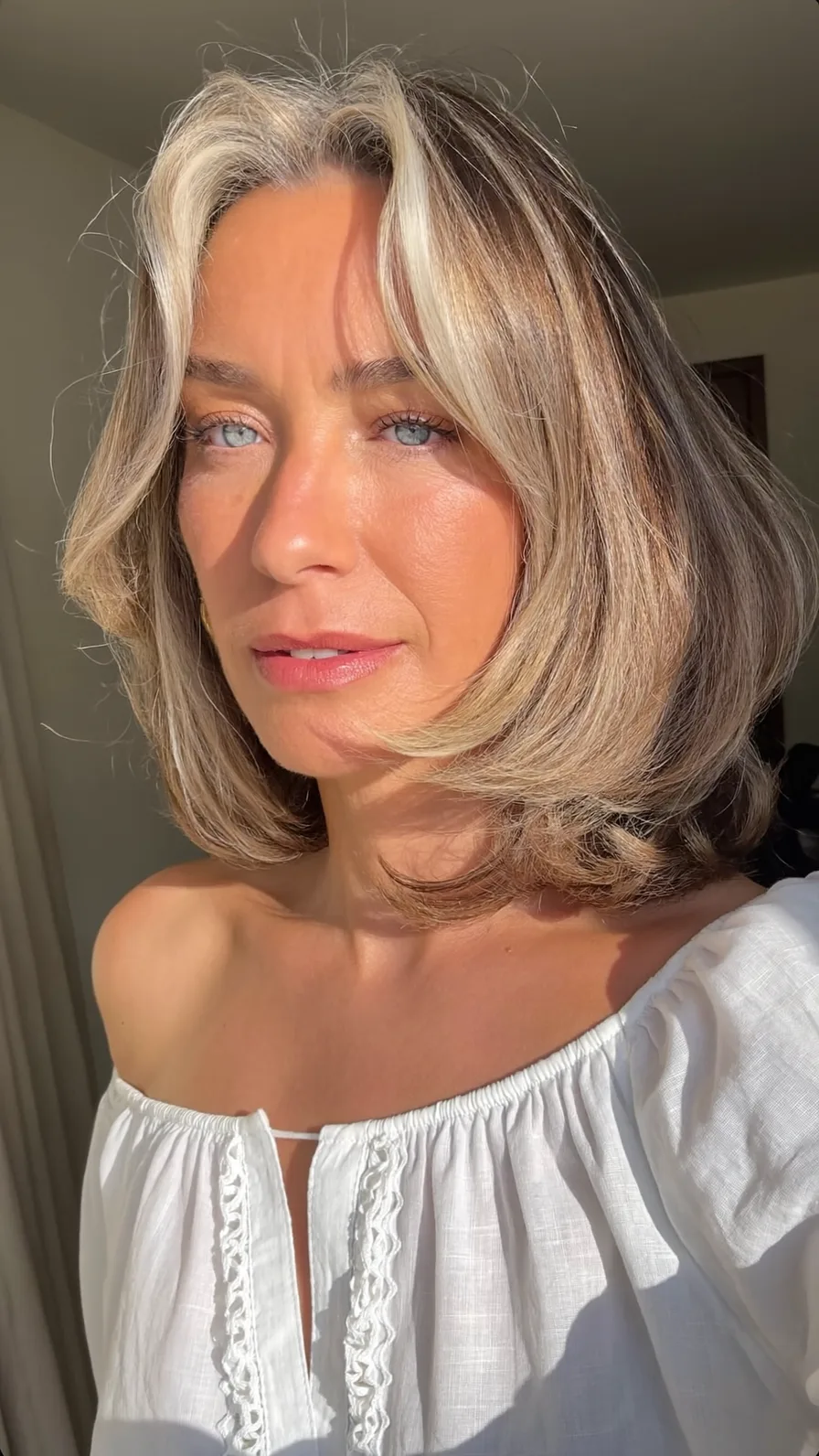 Shoulder-Length Bob with Ash Brown and Blonde Money-Piece Highlights