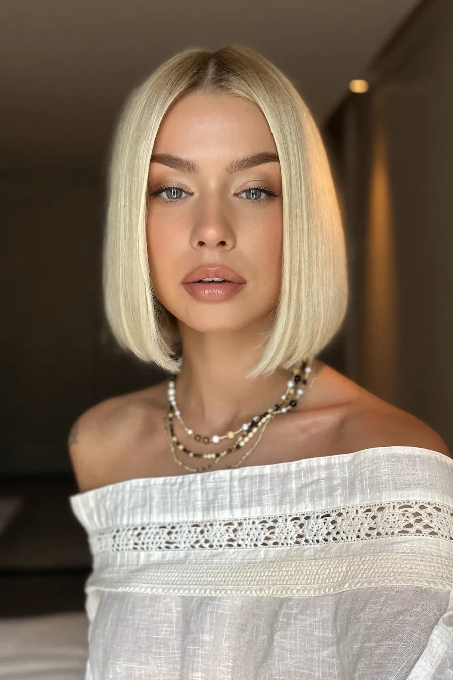 Chic Platinum Blonde Center-Parted Blunt Bob Hairstyle