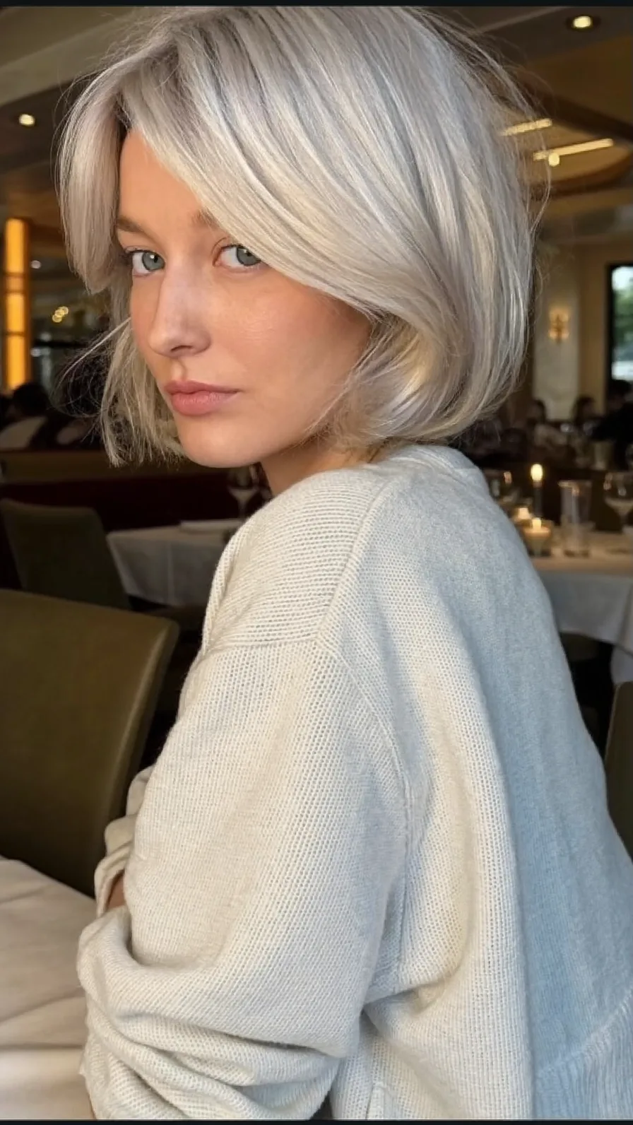 Chic Platinum Silver Bob with Flowing Curtain Bangs