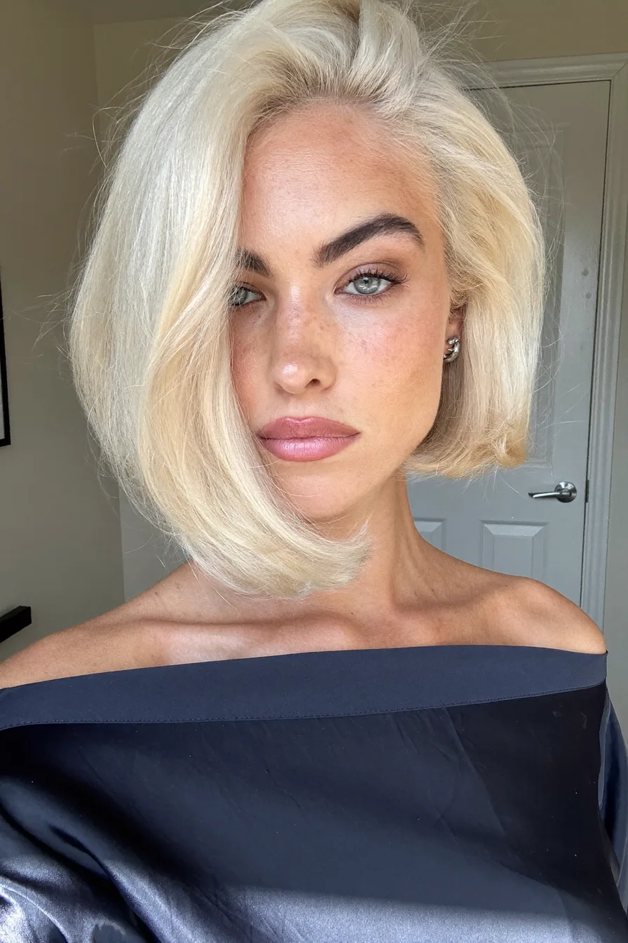 Sleek Platinum Blonde Classic Bob with Side Part