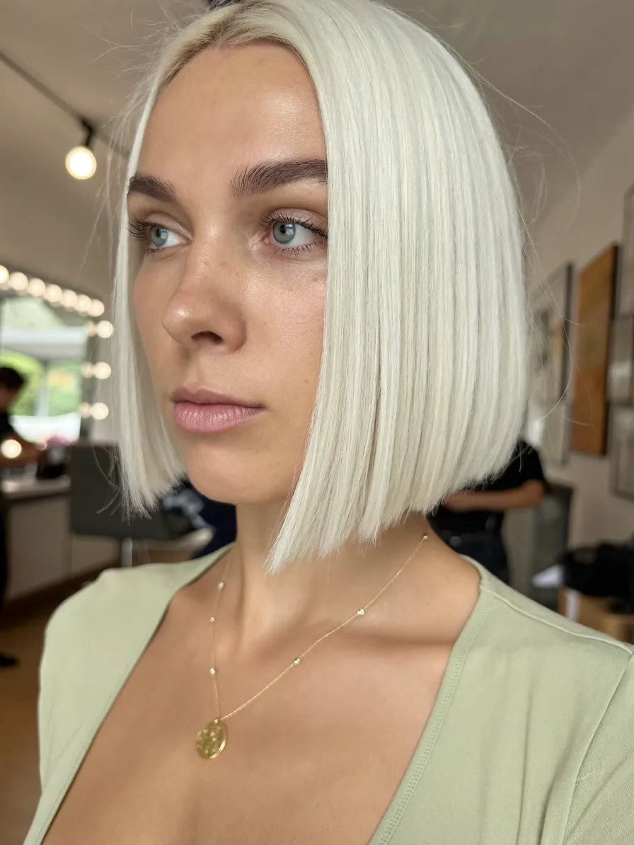 Modern Platinum Blonde Chin-Length Blunt Bob Hairstyle
