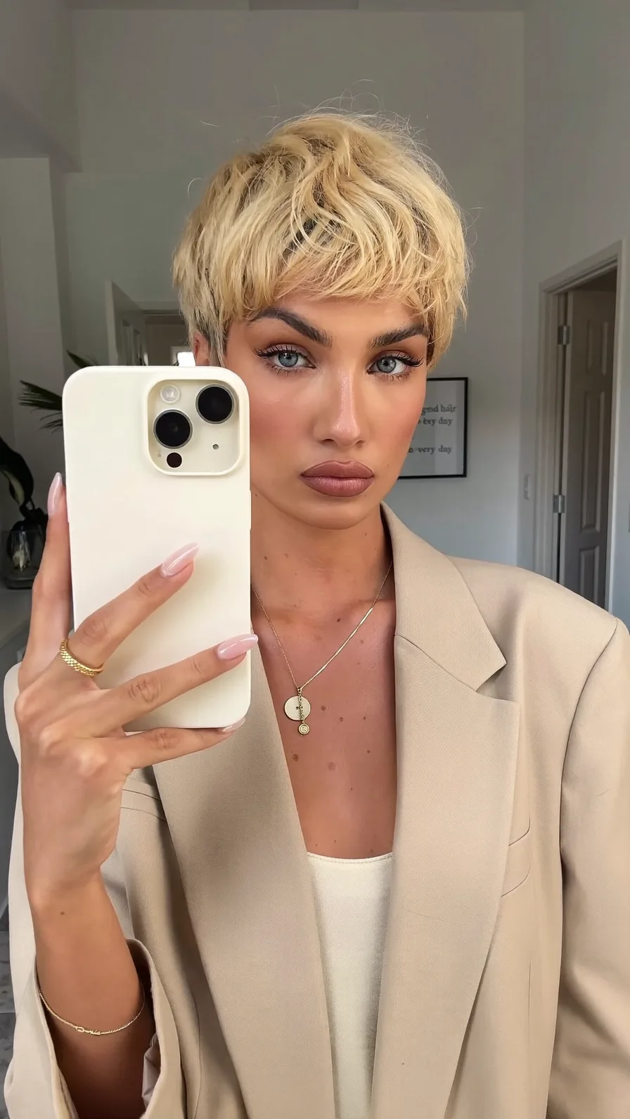 Textured Wavy Platinum Blonde Pixie with Choppy Layers