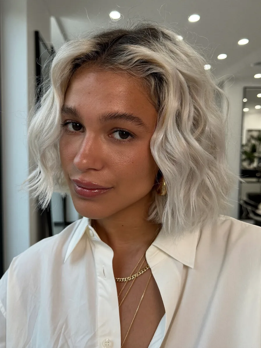 Chic Platinum Blonde Wavy Chin-Length Blunt Bob Hairstyle