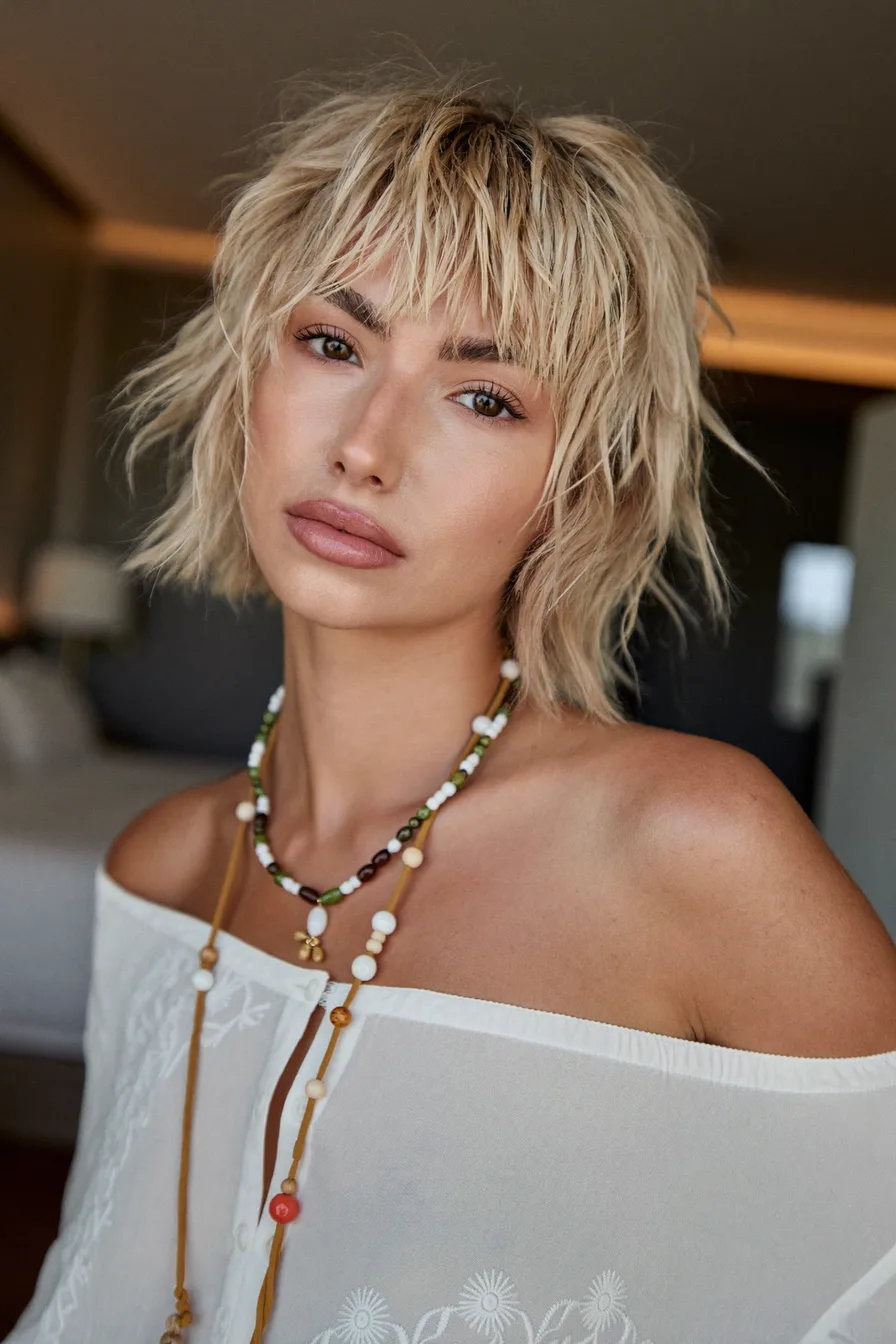 Textured Platinum Blonde Shag with Choppy Bangs