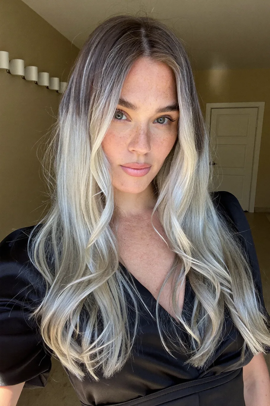 Platinum Blonde Balayage With Cascading Soft Waves