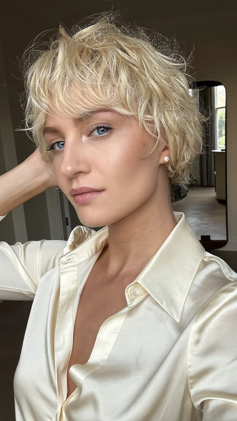Modern Textured Pixie Cut with Softer Curtain Bangs